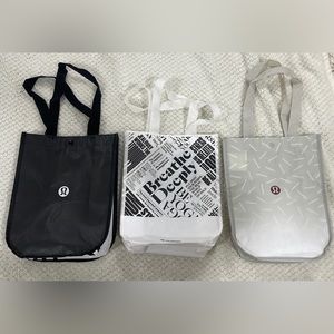 Lululemon Athletica shopping bags. All 3 sold together, not separately.